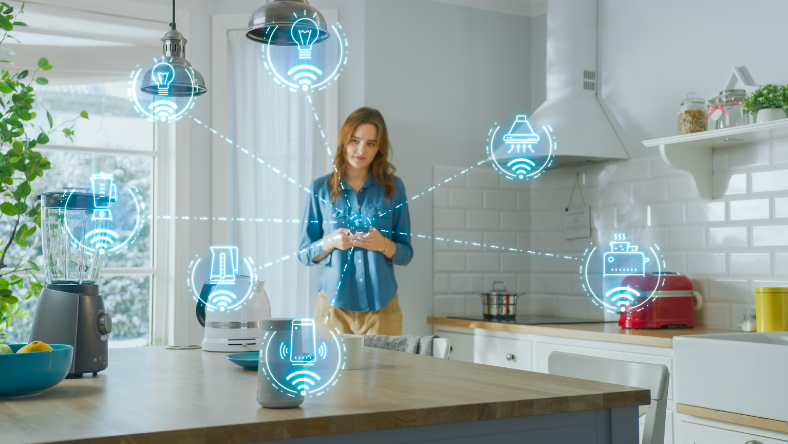 Woman standing in kitchen with smart appliances